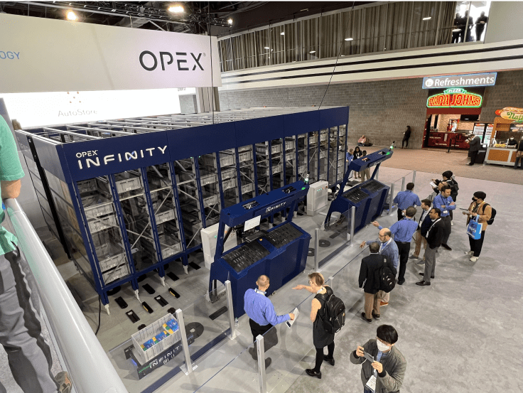 Bailey Brand Consulting OPEX Infinity Launch Booth MODEX photo showing people viewing machine